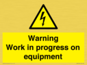 warning-work-in-progress-on-equipmentwith-electrical-hazard-symbol~